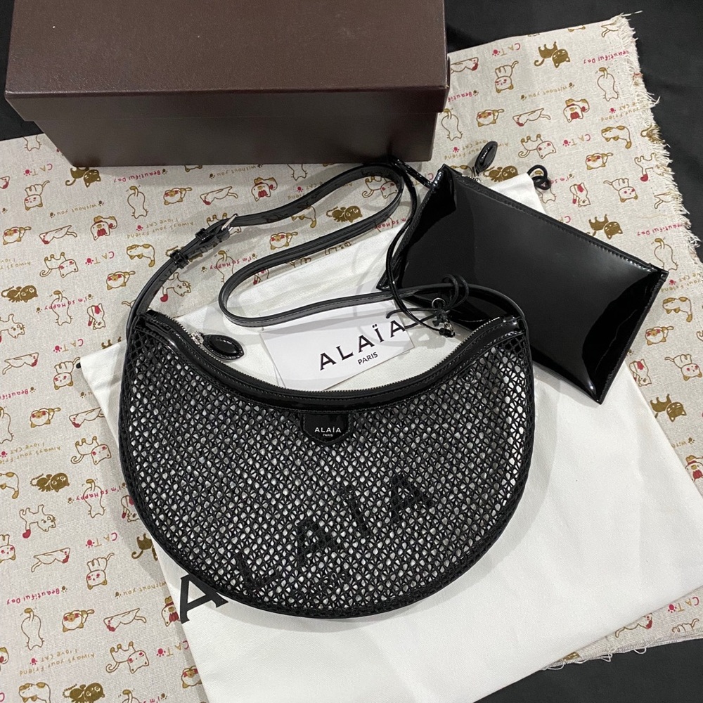 Alaïa Black Woven Crescent Shoulder Bag